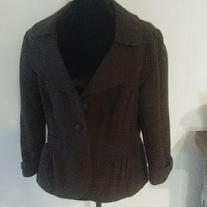 Brown fall lined blazer with tailored look.